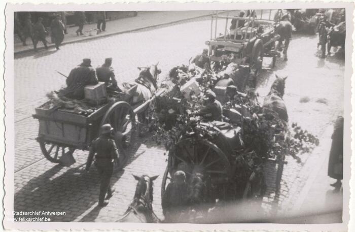 Soldiers with horses and carts on the streets