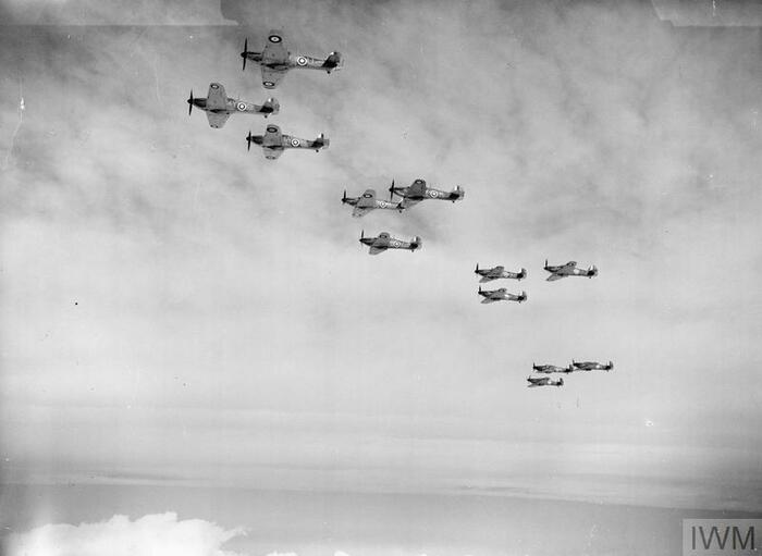 A dozen airplanes in the air