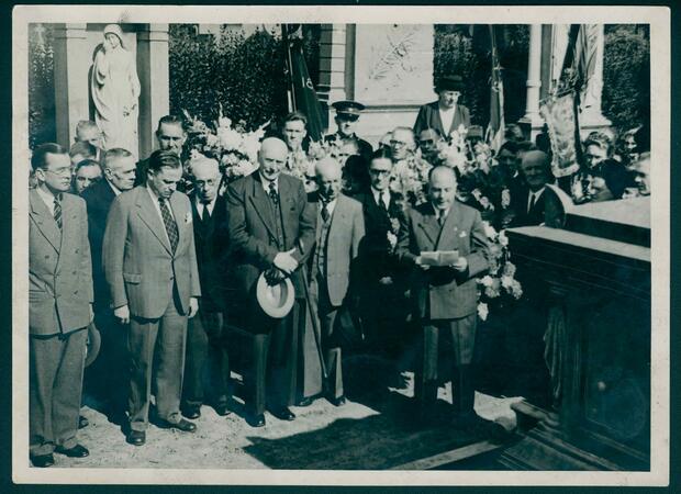 A group of people mourning Eric Sasse