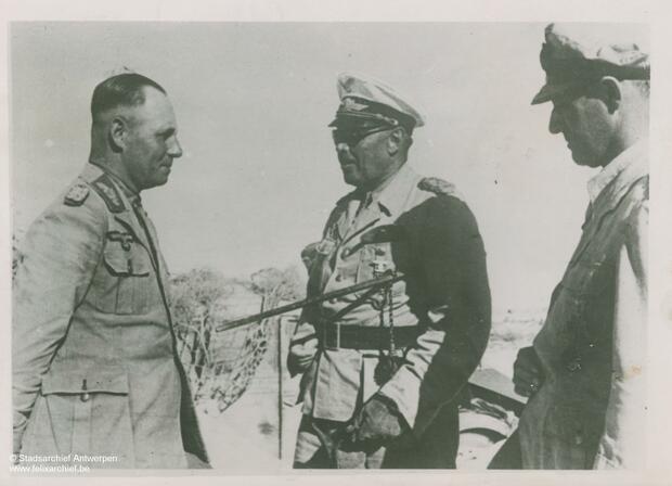 General Erwin Rommel facing two generals at El Alamein in Egypt