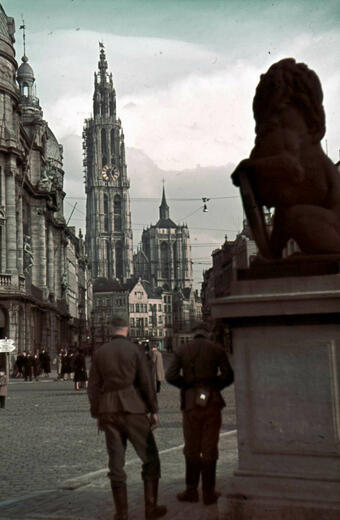 Two soldiers and the Cathedral of Our Lady in the background